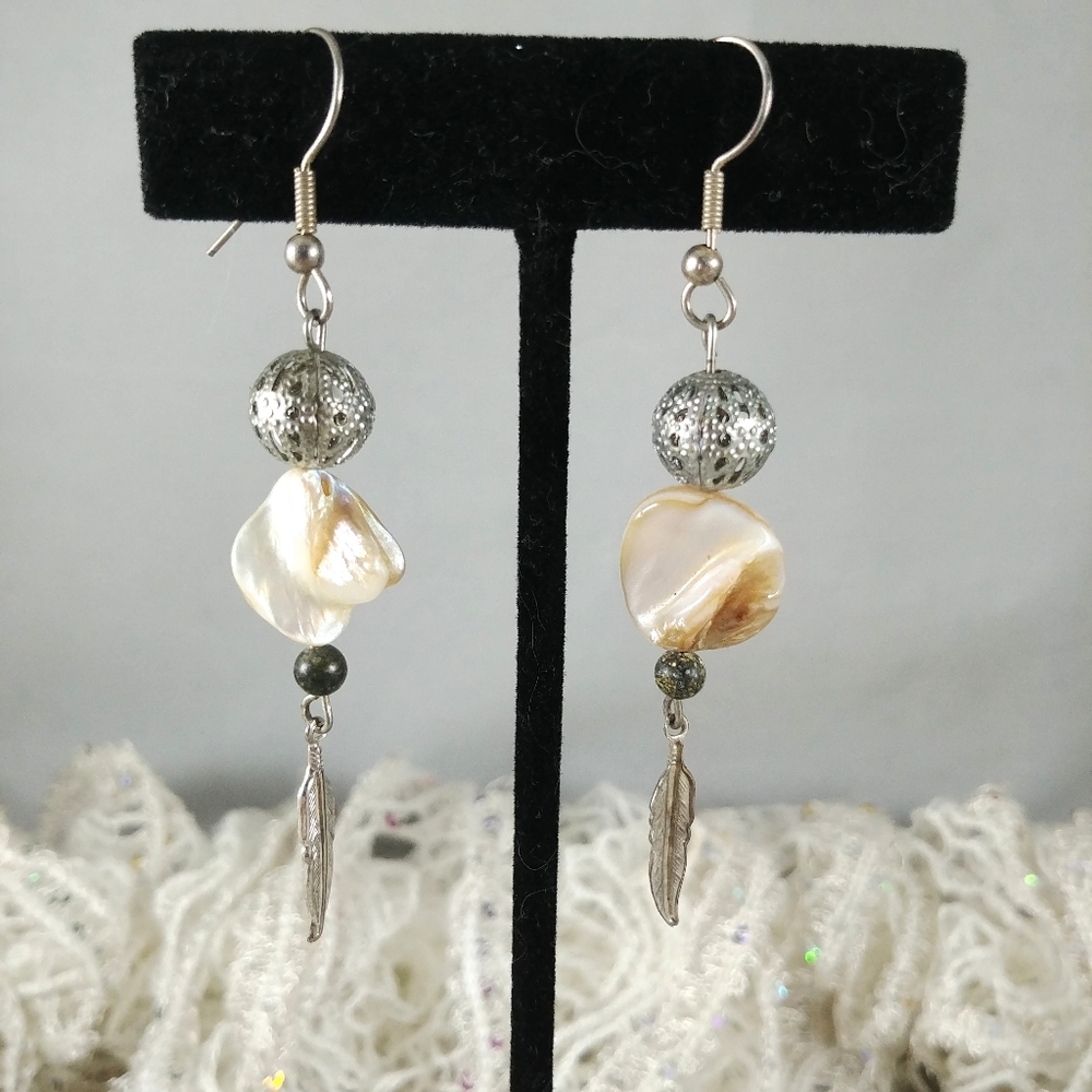 Mother of pearl shell bead with metal accent